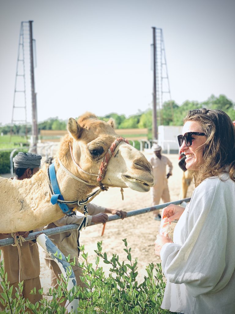 Amy at the Camel Race in Dubai.